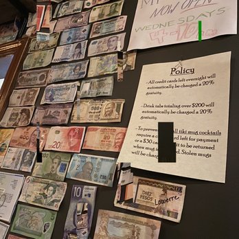 Maggie's Farm Rum - Wall of currency from around the world - Distilleries Near Me - Pittsburgh, Pennsylvania