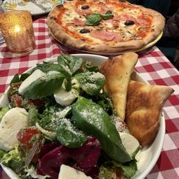 Pizza and salad. Pizza and salad.