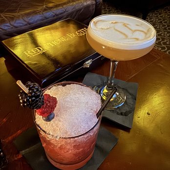 Red Phone Booth - Rum swizzle and whiskey sour - Cocktail Bars Near Me - Atlanta, Georgia Red Phone Booth - Rum swizzle and whiskey sour - Cocktail Bars Near Me - Atlanta, Georgia