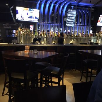 Yard House - Notice the pipes at the top of the picture. That's going to the taps. That's only half that are coming from the keg room. - New American Near Me - Atlanta, Georgia Yard House - Notice the pipes at the top of the picture. That's going to the taps. That's only half that are coming from the keg room. - New American Near Me - Atlanta, Georgia