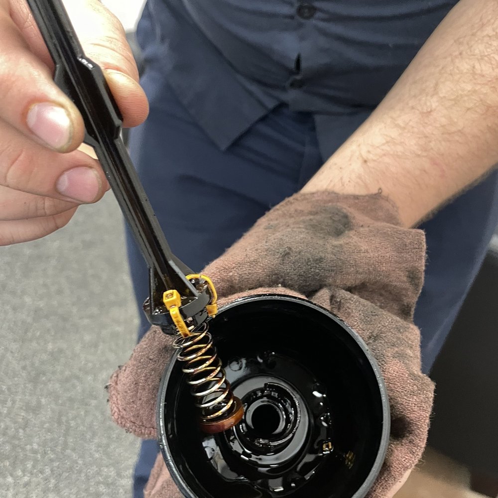 Tire Outlet - Oil filter housing zip tied - Tires Near Me - Green Cove Springs, Florida