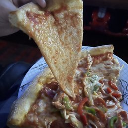 It was so greasy and watery that all the toppings fell off. Just garbage pizza!