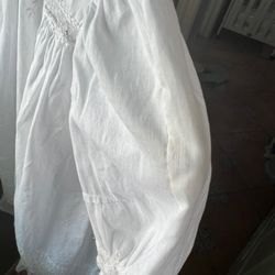 Great Lakes Clothing Care & Wedding Gown Specialists - Ripped sleeve fixed