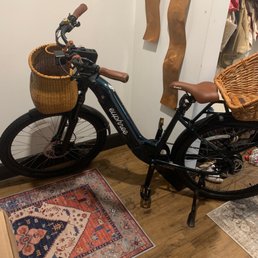 Euphree City Bike w front and rear wicker baskets.