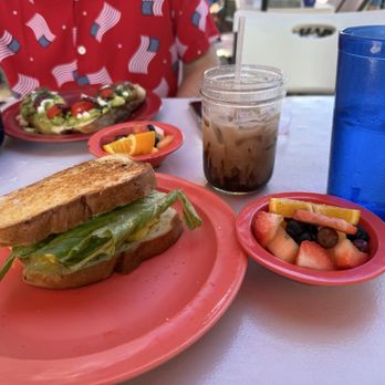 The Wild Iris Café - I ordered the breakfast sandwich on sourdough and added tomato, lettuce and onion! Yummy! - Cafes Near Me - Dunedin, Florida The Wild Iris Café - I ordered the breakfast sandwich on sourdough and added tomato, lettuce and onion! Yummy! - Cafes Near Me - Dunedin, Florida
