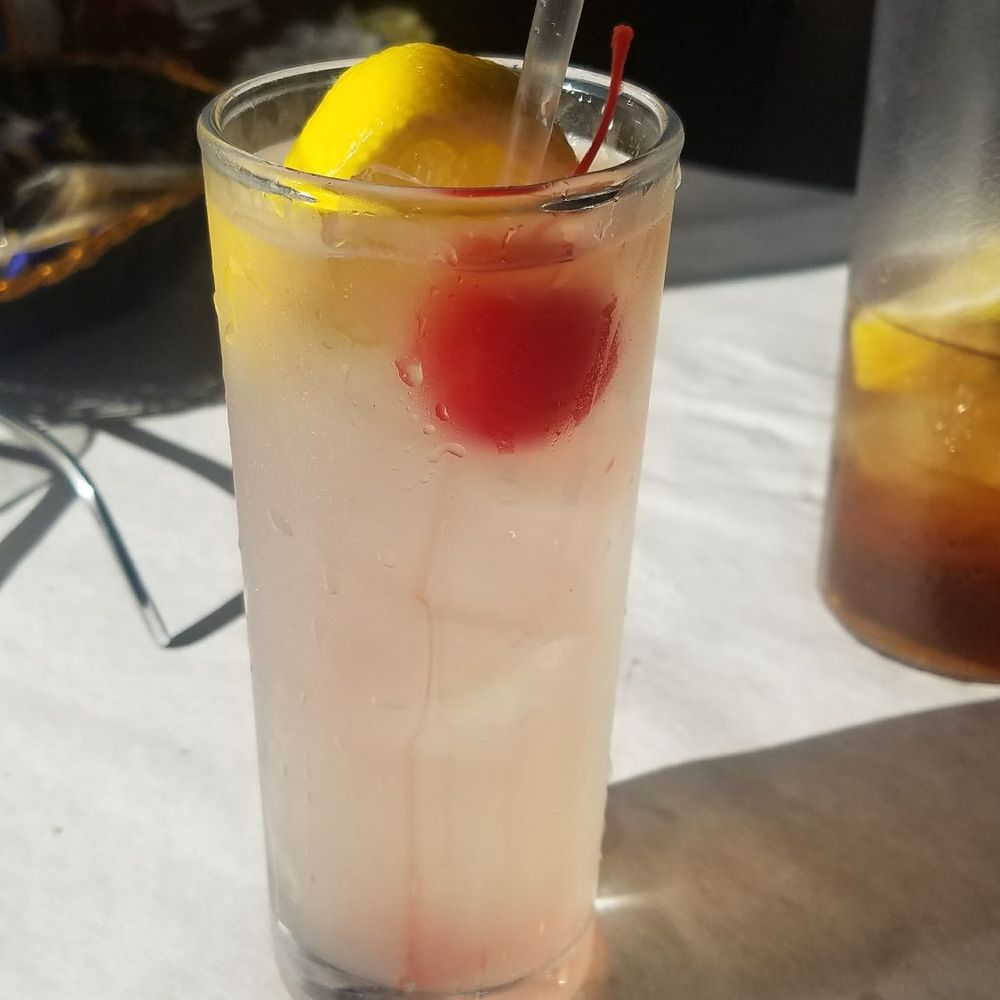 Under the Pier - Tom Collins, 2 shots according to menu $6.50, very tasty. My first ever and filled to the brim (I had a sip) - Seafood Near Me - Levittown, Pennsylvania