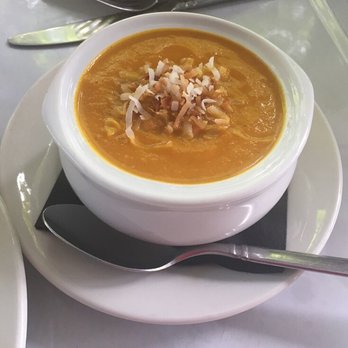 Roots Cafe - carrot ginger soup with toasted coconut - New American Near Me - Naples, New York