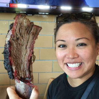 Killen's Barbecue - My SIL, beef rib about the size of her head lol - Barbeque Near Me - Pearland, Texas Killen's Barbecue - My SIL, beef rib about the size of her head lol - Barbeque Near Me - Pearland, Texas