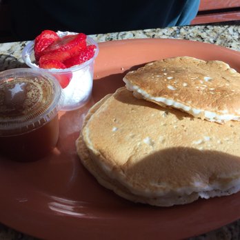 Kneaders Bakery & Cafe - Sourdough pancakes with strawberries, cream, and syrup. All you can eat for $5.99. - Cafes Near Me - Thornton, Colorado