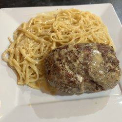 Wood Fired Oven - Chicken Rollitini -chicken breast stuffed with ham, ricotta, and Mozz, lightly breaded. Served with spaghetti in marsala sauce.