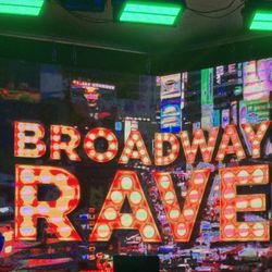 Ember Music Hall - The stage was so fun with lots of playbills and colorful lights