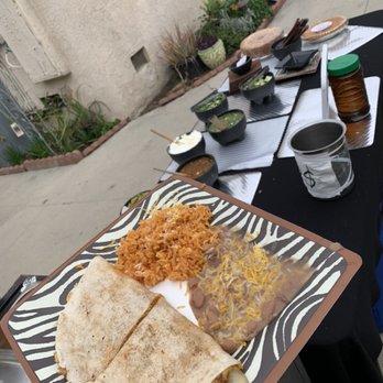 Arcelia's Tacos on Wheels - Loaded chicken quesadilla with rice and beans - Caterers Near Me