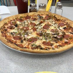Chaney's Pizza - Medium Thin Crust Combo Pizza