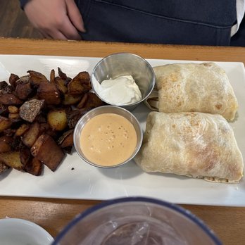 Wally's - Breakfast burrito with well done hash browns.   Come hungry - New American Near Me - Surf City, New Jersey