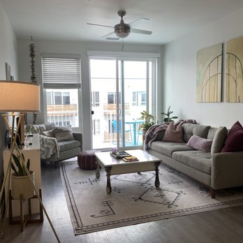 Deco Apartments - One bedroom living room. - Apartments Near Me - Denver, Colorado