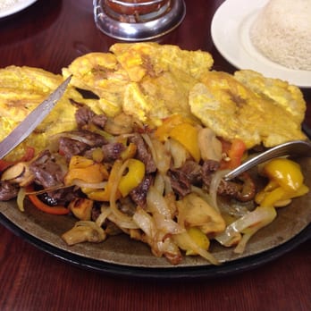 Villa De Colombia - Lean skirt steak with onions peppers and mushrooms.. Plantains and side of white rice - Colombian Near Me - Hackensack, New Jersey