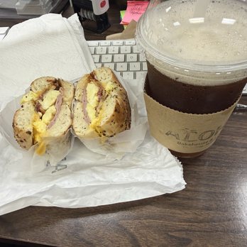 Aloha Bakehouse & Cafe - Breakfast sandwich on everything bagel. Mango iced tea . - Cafes Near Me - Honolulu, Hawaii
