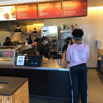 Chipotle Mexican Grill - a woman ordering food - Mexican Near Me - Mcdonough, Georgia