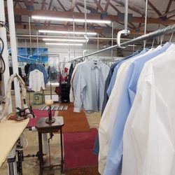 Fashion Cleaners - Iron station for touch ups and completed shirts.