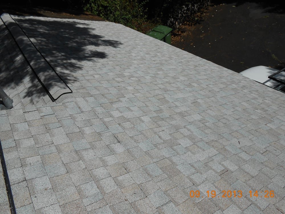 Slide of R.S. Toyama Roofing Service