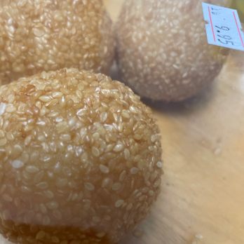 Chinese Grocery - Sesame balls /w red bean filling. About 7/$9.95. Heat one on a folded napkin 40 secs on high. Cut in half w/ scissors. Like a chewy mochi - Gift Shops Near Me - Westerly, Rhode Island