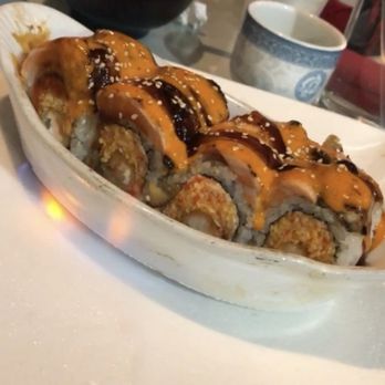 Sakura Blue - International roll. Served flaming! - Japanese Near Me - Louisville, Kentucky Sakura Blue - International roll. Served flaming! - Japanese Near Me - Louisville, Kentucky