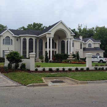 Choice Landscapes - the front of a home in a residential neighborhood - Landscaping Near Me - Ormond Beach, Florida Choice Landscapes - the front of a home in a residential neighborhood - Landscaping Near Me - Ormond Beach, Florida