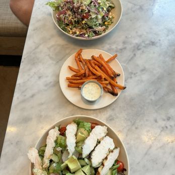 Flower Child - Chopped vegetable with chicken, sweet potato fries c and the Turkey & Avocado Cobb - Salad Near Me - Austin, Texas