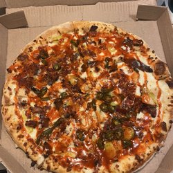 Alfredo as base. Chicken, extra bacon, steak, jalapeños and banana peppers. Drizzled in buffalo