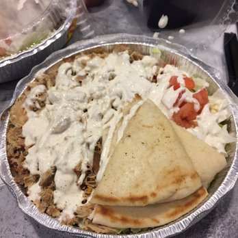 The Halal Guys - Regular chicken bowl with lots of white sauce. - Halal Near Me - Davie, Florida The Halal Guys - Regular chicken bowl with lots of white sauce. - Halal Near Me - Davie, Florida
