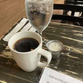 The Wayward Cafe - Coffee with cream, and water - Breakfast & Brunch Near Me - Seattle, Washington