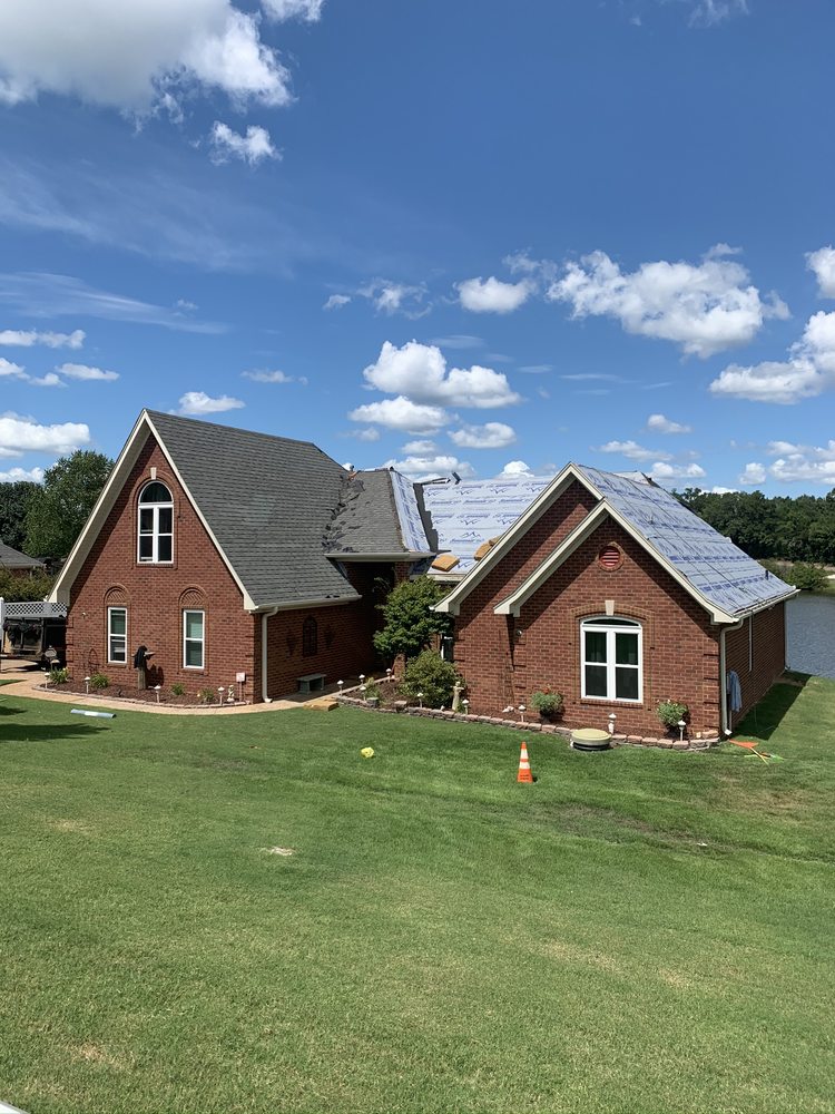 Slide of Evan's Roofing & Construction