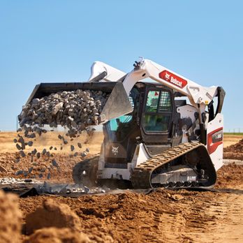 Mid-State Equipment - Bobcat T86 dumping and spreading rock with bucket - Farming Equipment Near Me - Watertown, Wisconsin