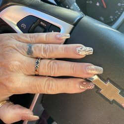 Angel’s Nails and Spa by Tan - This is when I got my nails done three weeks ago I am getting ready to go in again and have them re-done