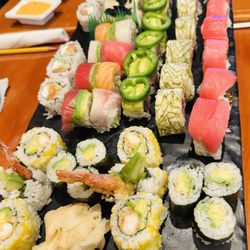 Yamazato Sushi & Spice - From  the left( spicy tuna kimchi,tiger fur,tres amigos,snowman,rainbow and Philadelphia) on the bottom avocado roll and honey shrimp