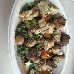 Mahana Bowl, half coconut rice half kale crunch salad, roasted mushrooms and roasted sweet potatoes, Key West chicken, cilantro vinaigrette Mahana Bowl, half coconut rice half kale crunch salad, roasted mushrooms and roasted sweet potatoes, Key West chicken, cilantro vinaigrette