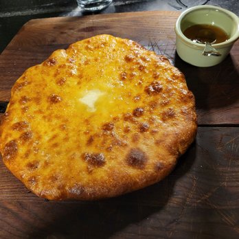 Nightjar Jazz Bar - Bread & Cheese a Georgian-style Khachapuri cheese-stuffed bread, served warm - Jazz & Blues Near Me - Woodmere, Ohio Nightjar Jazz Bar - Bread & Cheese a Georgian-style Khachapuri cheese-stuffed bread, served warm - Jazz & Blues Near Me - Woodmere, Ohio