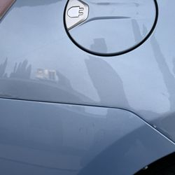 Markham Boling Collision Center - On the right above the bumper more paint chipped from bumper being hit upwards that the crew missed to fix.