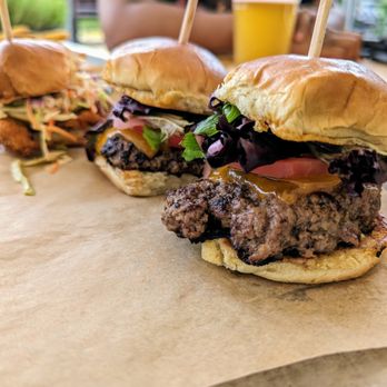 Franklin Motors - Sliders. $15. Cheeseburgers. Baldwin Beef (Yanceyville, NC), pickled onion, garlic aioli. Cajun-fried Chicken, pickles, slaw. Brioche. - Beer Gardens Near Me - Chapel Hill, North Carolina