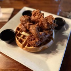 Fried Chicken and bacon cheddar waffle with whisky maple syrup