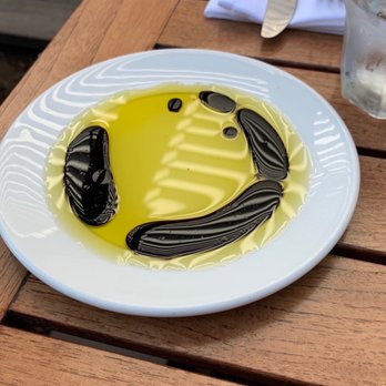 Pietro's - It's all smiles on the olive oil + balsamic plate - Italian Near Me - Lodi, California