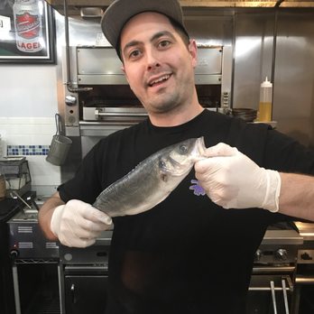 Catch Oyster Bar - Watching mike cook is always fun! - Seafood Near Me - Patchogue, New York