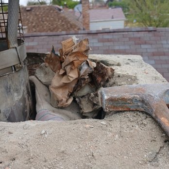 Second City Roofing & Exteriors - Trash left by prior company in the chimney - Roofing Near Me - Chicago, Illinois