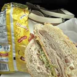 Daisy's Deli - Turkey American cheese sub  With lettuce tomato onion mayo and oil and vinegar