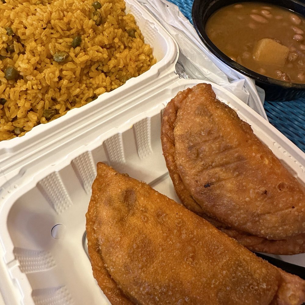 El Punto Boricua - Two beef and cheese empanadas with a side of large yellow rice and beans. - Puerto Rican Near Me - Kenmore, New York