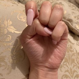 If you know about getting Quality nails you can see how slanted this nail is. Not to mention how botched up the whole dip Powder looks.