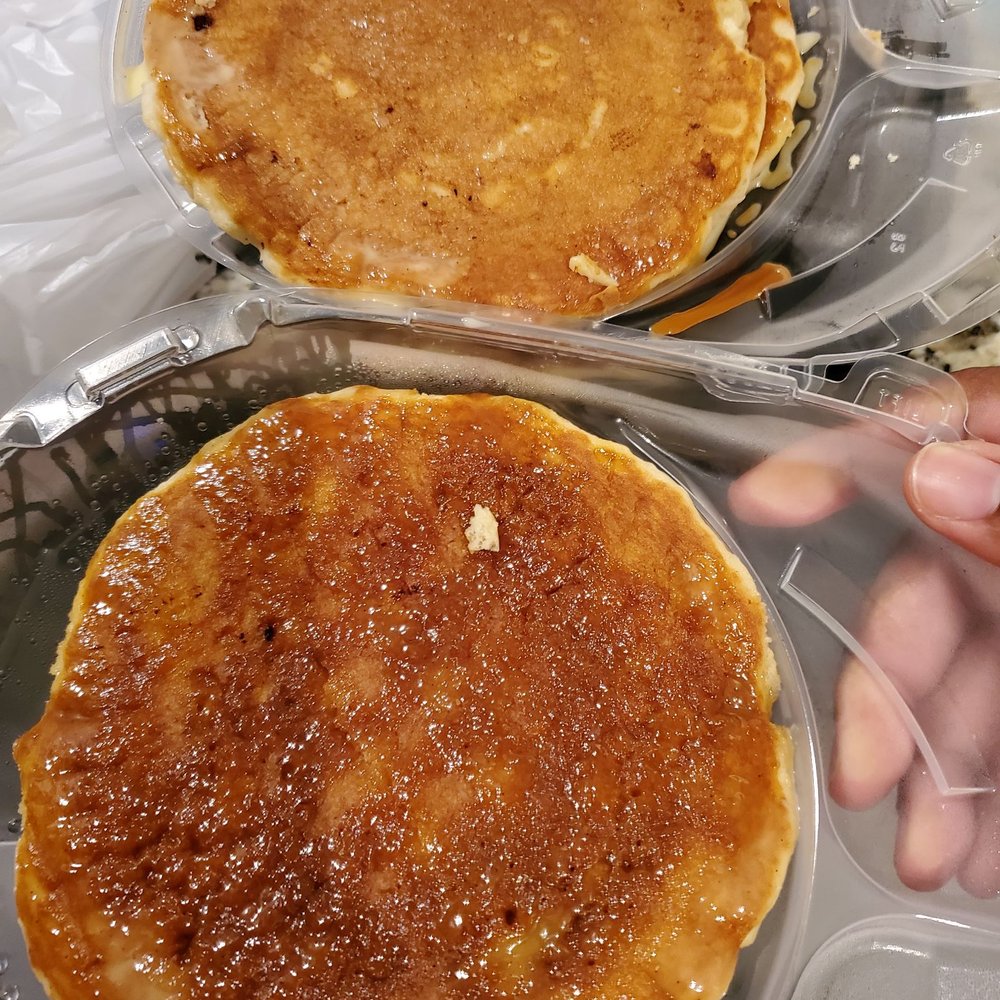 Burned pancakes.  Look at the difference between the ones that are done and the one that was burned.