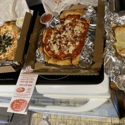 Joey G's Pizzeria - Stuffed ranch Romero and stuffed everything but the kitchen sink pizzas and garlic cheese bread