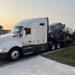Extra Mile Transport - Extra Mile Transport company truck loaded with customer cars