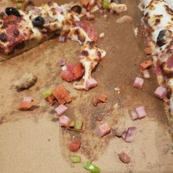 Antonino’s Pizza - Tiny pieces of toppings